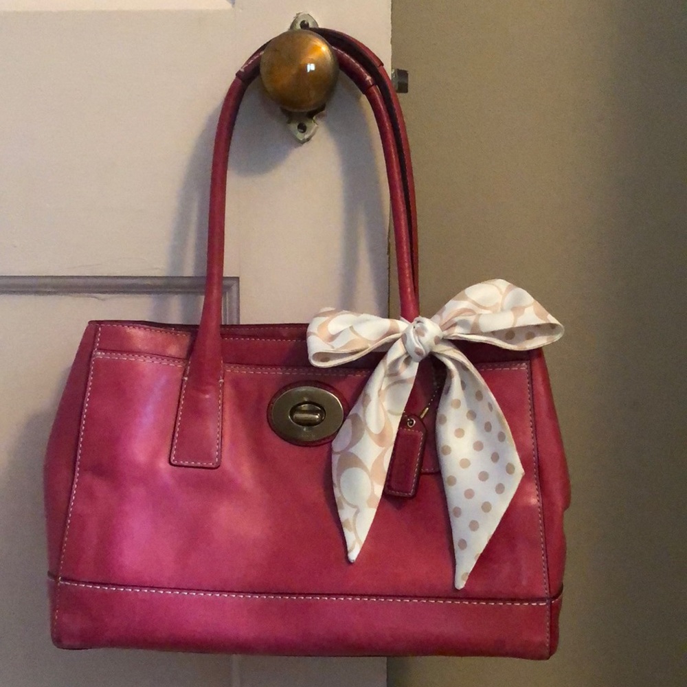 Medium size dark pink Coach purse